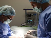 Dr. Michael and Kathy in surgery